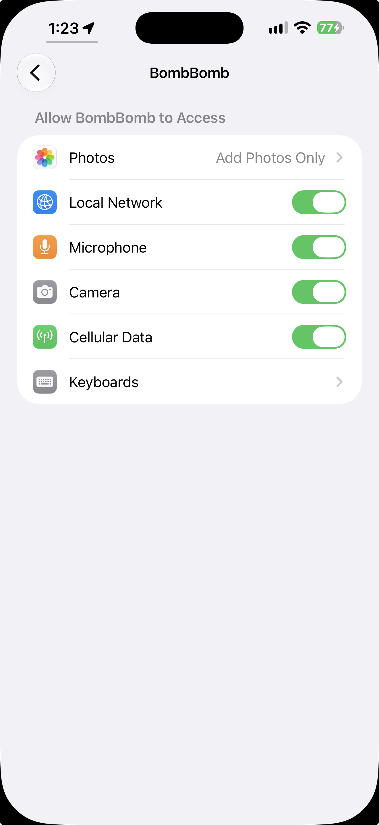 BombBomb's page in iPhone Settings with the Camera, Microphone, and Photos permissions