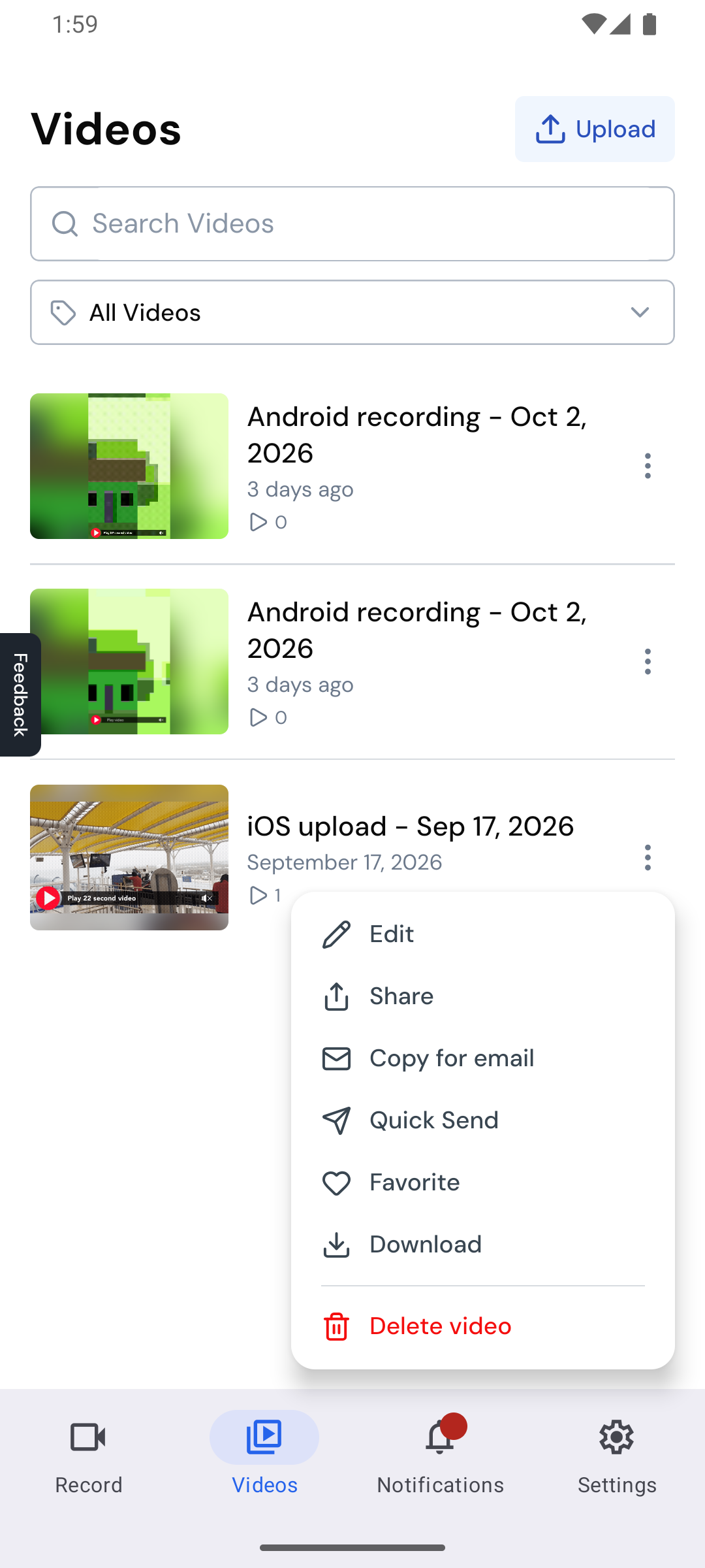 The quick-actions menu open on a video in the Videos tab